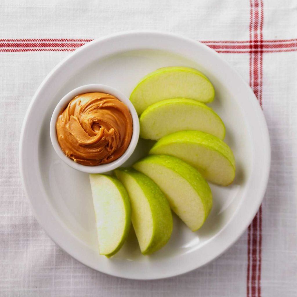 Healthy Snack Ideas: Apple Slices With Natural Peanut Butter