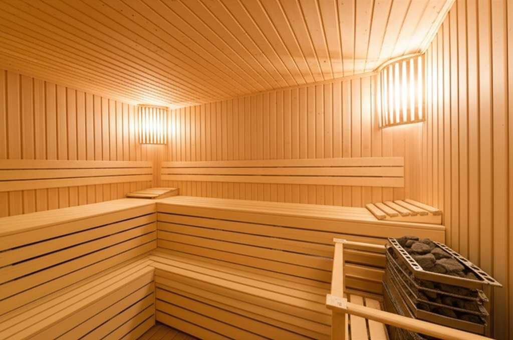 Generate a high-quality, relevant image prompt for an article about: Is Sauna Or Steam Room Better F
